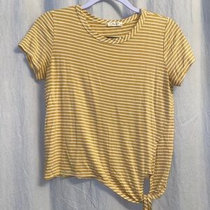 Yellow and white striped t-shirt.